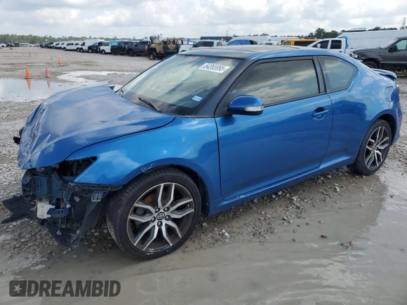 2016 Scion tC z VIN JTKJF5C78GJ016405, wystawiony jako Copart lot #54265995 z przebiegiem 89 467 mil mil oraz Szkody całkowita. Historia ofert i sprzedaży dostępna na DreamBid. Obrazek 1.