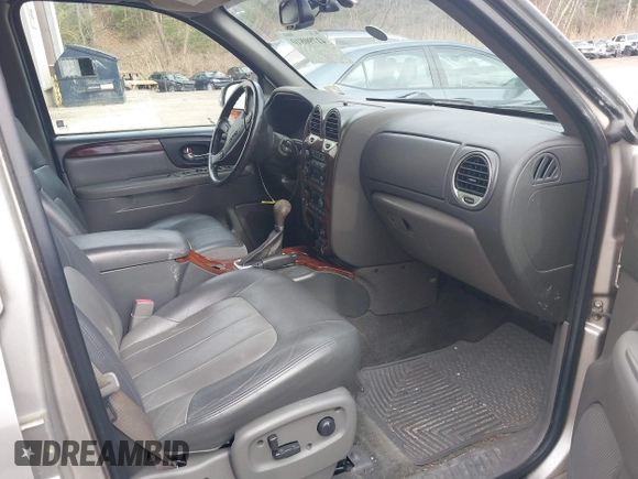 2004 GMC Envoy SLE with VIN 1GKDS13S442350938, listed as a IAAI auction lot 41790810 with 161,998 mi miles. Bid and sale history available at carsss.com. Image 5.