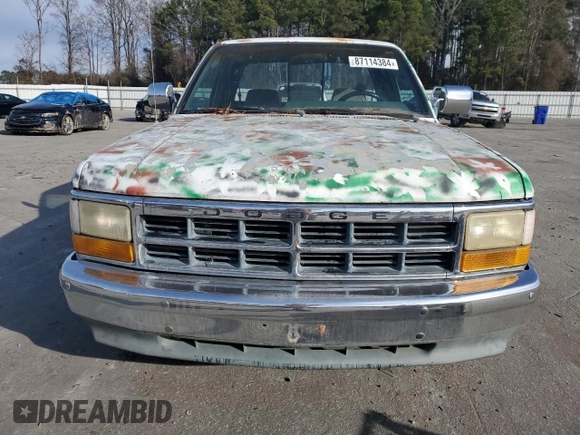 1995 Dodge Dakota z VIN 1B7GL23X7SS250840, wystawiony jako Copart lot #87114384 z przebiegiem 123 860 mil mil oraz Czysty tytuł • Clean title. Historia ofert i sprzedaży dostępna na DreamBid. Obrazek 5.