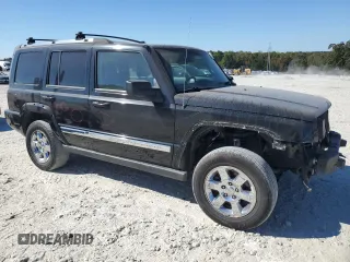 2006 Jeep Commander Limited with VIN 1J8HH58N56C291880, listed as a Copart auction lot 71543874 with 217,366 mi miles and Salvage title. Bid and sale history available at DreamBid. Image 4.