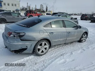 2014 Volkswagen CC Sport with VIN WVWBN7AN3EE523553, listed as a Copart auction lot 87627605 with 170,968 mi miles and Salvage Title. Bid and sale history available at carsss.com. Image 3.