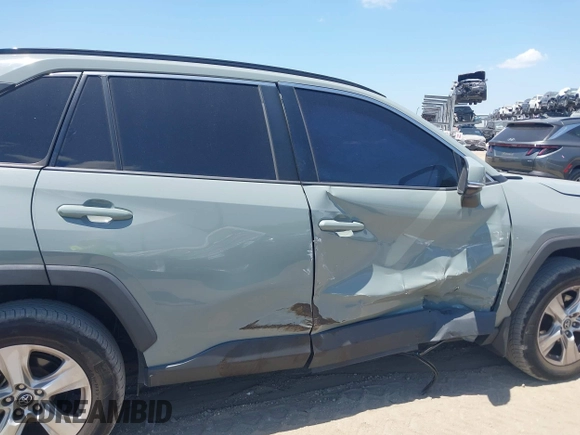 2020 Toyota RAV4 XLE with VIN 2T3W1RFV0LW069849, listed as a IAAI auction lot 42138074 with 112,062 mi miles and . Bid and sale history available at DreamBid. Image 6.