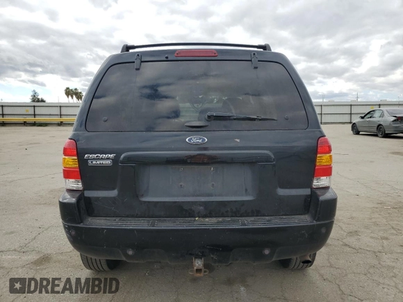 2004 Ford Escape Limited with VIN 1FMCU04134KA61949, listed as a Copart auction lot 47377455 with 205,480 mi miles and Salvage title. Bid and sale history available at DreamBid. Image 6.