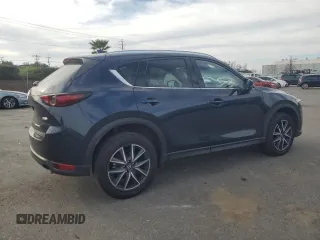 2018 Mazda CX-5 Grand Touring with VIN JM3KFADM7J0380568, listed as a Copart auction lot 48749015 with 53,401 mi miles and Salvage Title. Bid and sale history available at carsss.com. Image 3.