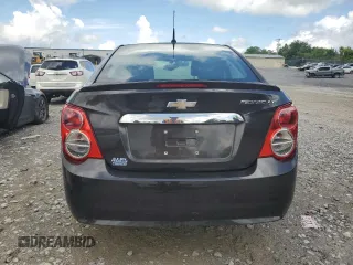2014 Chevrolet Sonic LT z VIN 1G1JC5SH1E4221918, wystawiony jako Copart lot #56589105 z przebiegiem 152 320 mil mil oraz Szkoda całkowita • Salvage title. Historia ofert i sprzedaży dostępna na DreamBid. Obrazek 6.