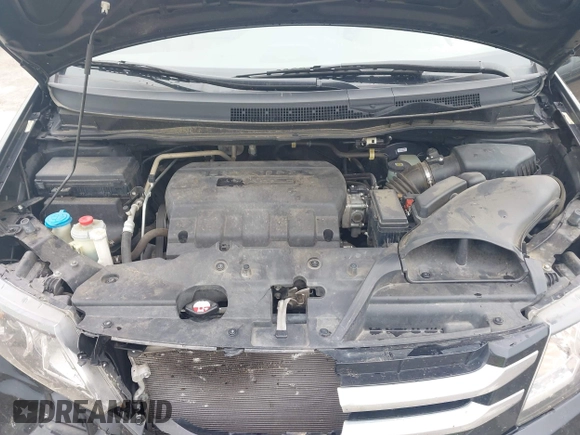 2014 Honda Odyssey EX-L with VIN 5FNRL5H64EB114709, listed as a IAAI auction lot 42131146 with 145,616 mi miles and . Bid and sale history available at DreamBid. Image 10.