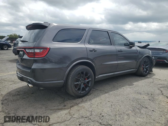 2021 Dodge Durango SRT Hellcat with VIN 1C4SDJH90MC845182, listed as a Copart auction lot 58799525 with Not provided miles and Salvage title. Bid and sale history available at DreamBid. Image 3.