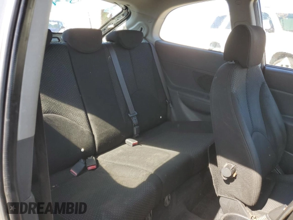 2007 Hyundai Accent SE z VIN KMHCN36C47U027122, wystawiony jako Copart lot #52224605 z przebiegiem 169 022 mil mil oraz Szkoda całkowita • Salvage title. Historia ofert i sprzedaży dostępna na DreamBid. Obrazek 10.