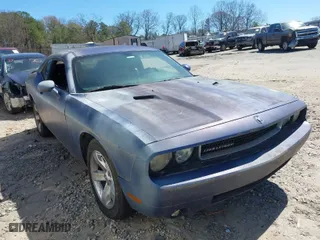 2009 Dodge Challenger SE with VIN 2B3LJ44V59H606931, listed as a IAAI auction lot 41823743 with NaN miles. Bid and sale history available at carsss.com. Image 1.