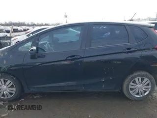 2015 Honda Fit LX with VIN 3HGGK5H50FM768011, listed as a IAAI auction lot 41499374 with 142,211 mi miles and . Bid and sale history available at DreamBid. Image 15.