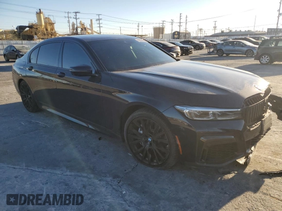 2021 BMW 7 Series 740i with VIN WBA7T2C01MCF72583, listed as a Copart auction lot 88601095 with 57,227 mi miles and Salvage title. Bid and sale history available at DreamBid. Image 4.