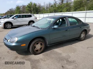 1997 Ford Taurus GL with VIN 1FALP52U4VA323402, listed as a Copart auction lot 65742235 with 43,415 mi miles and Clean title. Bid and sale history available at DreamBid. Image 1.