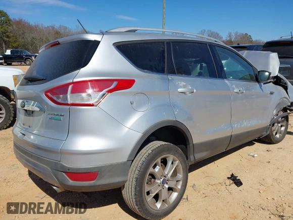 2015 Ford Escape Titanium with VIN 1FMCU0JX2FUB70760, listed as a IAAI auction lot 41649089 with 1 mi miles. Bid and sale history available at carsss.com. Image 4.