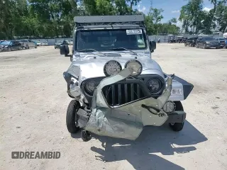 2005 Jeep Wrangler Sport z VIN 1J4FA49S75P324462, wystawiony jako Copart lot #59818995 z przebiegiem 183 558 mil mil oraz Nie do naprawy • Non repairable. Historia ofert i sprzedaży dostępna na DreamBid. Obrazek 13.