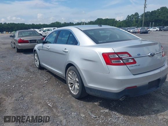 2013 Ford Taurus Limited with VIN 1FAHP2F87DG235392, listed as a IAAI auction lot 42700160 with 123,904 mi miles and . Bid and sale history available at DreamBid. Image 3.