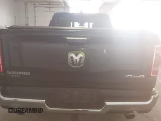 2020 Ram 1500 Laramie with VIN 1C6SRFDT7LN142009, listed as a IAAI auction lot 42330341 with 108,351 mi miles and . Bid and sale history available at DreamBid. Image 16.