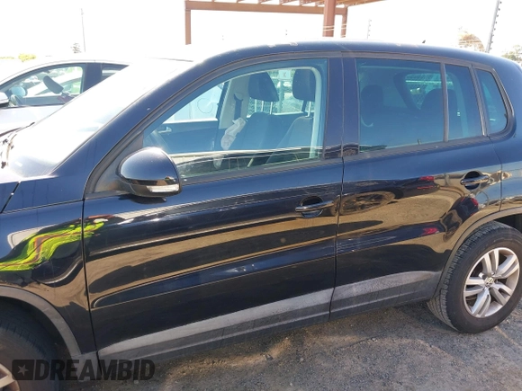 2012 Volkswagen Tiguan LE with VIN WVGAV7AX1CW557250, listed as a IAAI auction lot 42300694 with 122,310 mi miles and . Bid and sale history available at DreamBid. Image 14.
