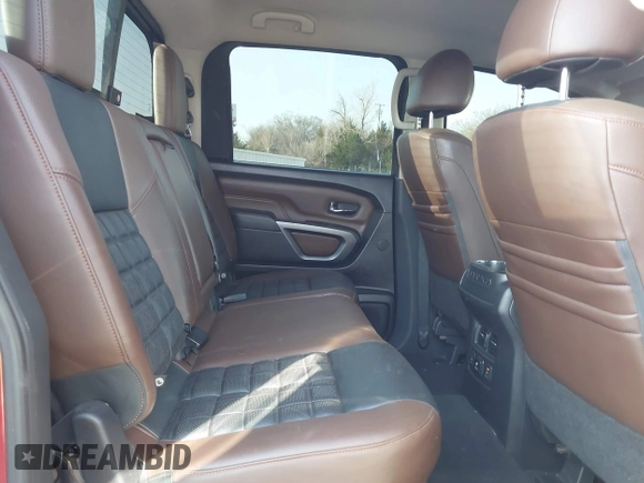 2017 Nissan Titan Pro-4X z VIN 1N6BA1F43HN562377, wystawiony jako IAAI lot #41786607 z przebiegiem 95 207 mil mil oraz . Historia ofert i sprzedaży dostępna na DreamBid. Obrazek 8.