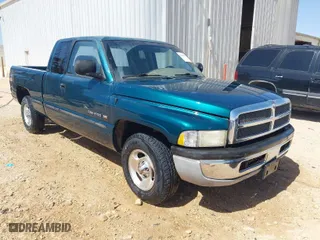 1999 Dodge Ram 1500 with VIN 3B7HC13Y0XG169104, listed as a IAAI auction lot 41936221 with 183,546 mi miles. Bid and sale history available at carsss.com. Image 1.