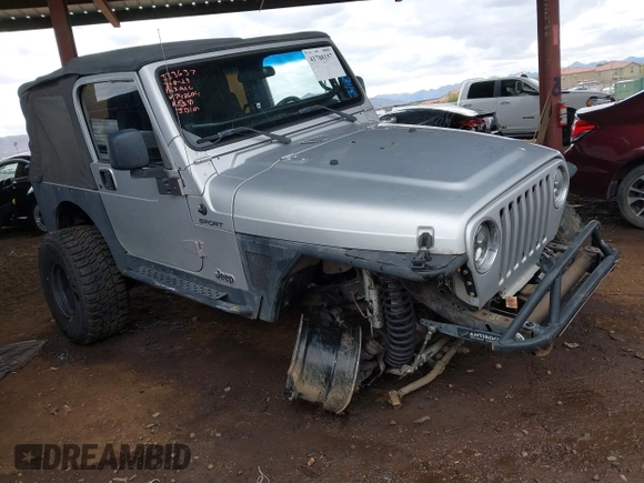 2006 Jeep Wrangler Sport with VIN 1J4FA49S46P748604, listed as a IAAI auction lot 41788157 with 128,249 mi miles. Bid and sale history available at carsss.com. Image 6.