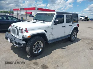 2019 Jeep Wrangler Unlimited Sahara with VIN 1C4HJXEN7KW535887, listed as a IAAI auction lot 42217440 with 91,226 mi miles and . Bid and sale history available at DreamBid. Image 18.
