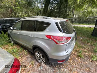 2016 Ford Escape Titanium with VIN 1FMCU9JXXGUC33190, listed as a Copart auction lot 51374865 with 222,129 mi miles and Clean Title. Bid and sale history available at carsss.com. Image 3.