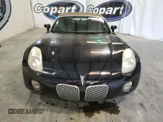 2007 Pontiac Solstice z VIN 1G2MB35B17Y128125, wystawiony jako Copart lot #56049485 z przebiegiem 167 817 mil mil oraz Czysty tytuł • Clean title. Historia ofert i sprzedaży dostępna na DreamBid. Obrazek 5.