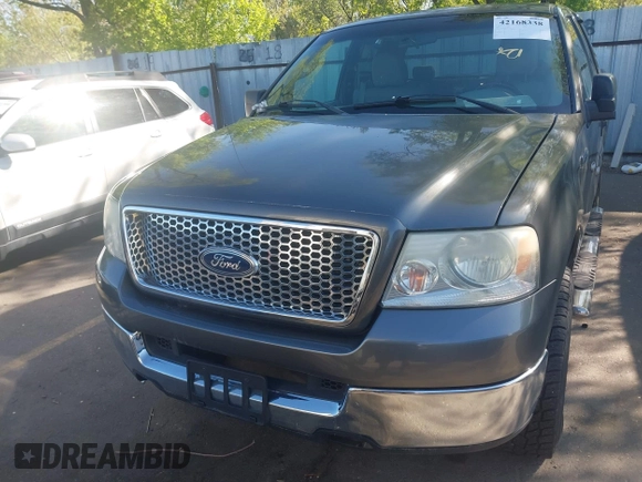 2005 Ford F-150 XLT with VIN 1FTPX14585NB56142, listed as a IAAI auction lot 42168338 with 208,074 mi miles. Bid and sale history available at carsss.com. Image 6.