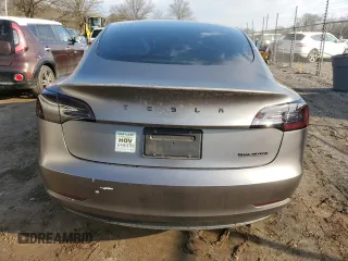 2022 Tesla Model 3 Long Range with VIN 5YJ3E1EBXNF272496, listed as a Copart auction lot 43973435 with 28,450 mi miles and Salvage Title. Bid and sale history available at DreamBid. Image 6.