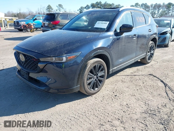 2022 Mazda CX-5 2.5 Turbo with VIN JM3KFBAY4N0534690, listed as a IAAI auction lot 41716988 with 23,910 mi miles and . Bid and sale history available at carsss.com. Image 17.