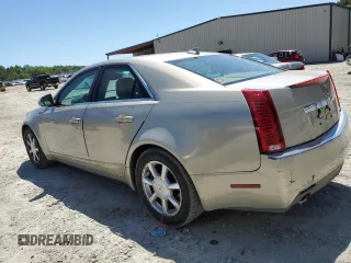 2009 Cadillac CTS RWD with VIN 1G6DF577090143935, listed as a Copart auction lot 54719885 with 158,801 mi miles and Salvage Title. Bid and sale history available at DreamBid. Image 2.