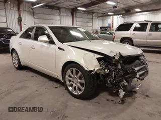 2009 Cadillac CTS AWD w/1SB with VIN 1G6DT57VX90110769, listed as a IAAI auction lot 41696744 with 164,127 mi miles. Bid and sale history available at carsss.com. Image 1.