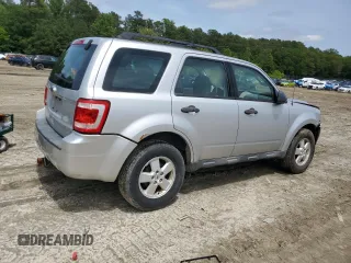 2010 Ford Escape XLS with VIN 1FMCU0C70AKB52226, listed as a Copart auction lot 58241455 with 237,785 mi miles and Salvage title. Bid and sale history available at DreamBid. Image 3.