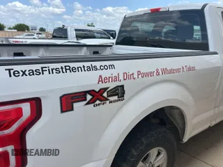 2018 Ford F-150 XL with VIN 1FTFW1E55JKE25772, listed as a IAAI auction lot 42882671 with 132,909 mi miles and . Bid and sale history available at DreamBid. Image 9.