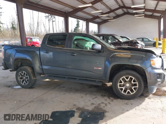 2015 GMC Canyon 2WD SLE with VIN 1GTG5BE37F1265497, listed as a IAAI auction lot 41507236 with 101,385 mi miles. Bid and sale history available at carsss.com. Image 14.