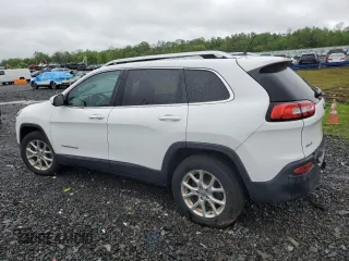 2015 Jeep Cherokee Latitude z VIN 1C4PJMCSXFW739396, wystawiony jako Copart lot #56282915 z przebiegiem 114 309 mil mil oraz Szkoda całkowita • Salvage title. Historia ofert i sprzedaży dostępna na DreamBid. Obrazek 2.