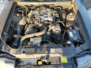 2004 Ford Mustang Deluxe z VIN 1FAFP44654F143868, wystawiony jako Copart lot #52991535 z przebiegiem 167 015 mil mil oraz Czysty tytuł • Clean title. Historia ofert i sprzedaży dostępna na DreamBid. Obrazek 11.
