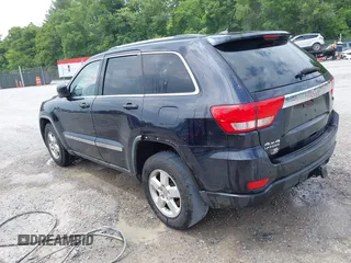 2011 Jeep Grand Cherokee Laredo with VIN 1J4RR4GG8BC543468, listed as a IAAI auction lot 42431481 with 224,639 mi miles and . Bid and sale history available at DreamBid. Image 3.