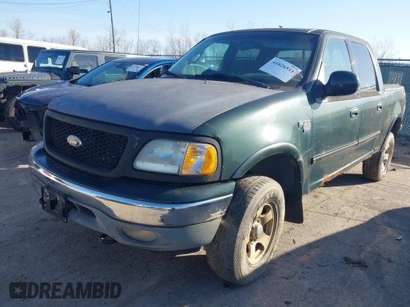 2002 Ford F-150 XLT with VIN 1FTRW08L12KB71710, listed as a IAAI auction lot 41826511 with 1 mi miles. Bid and sale history available at carsss.com. Image 6.