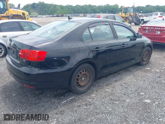2014 Volkswagen Jetta SE with VIN 3VWD17AJ2EM428149, listed as a IAAI auction lot 42684150 with 206,924 mi miles and . Bid and sale history available at DreamBid. Image 4.