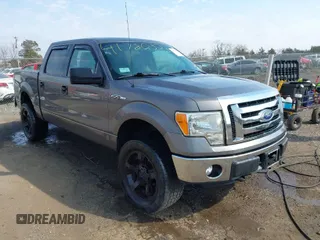 2011 Ford F-150 XL with VIN 1FTFW1EF3BKD68322, listed as a IAAI auction lot 41780323 with 163,871 mi miles. Bid and sale history available at carsss.com. Image 1.