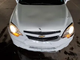 2013 Chevrolet Captiva Sport LTZ with VIN 3GNAL4EK0DS619409, listed as a Copart auction lot 82646974 with 90,590 mi miles and Salvage Title. Bid and sale history available at DreamBid. Image 12.