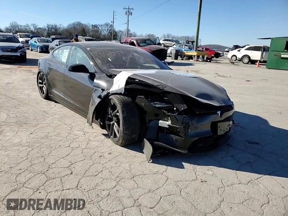 2023 Tesla Model S with VIN 5YJSA1E5XPF519570, listed as a Copart auction lot 80573863 with Not provided miles and Salvage title. Bid and sale history available at DreamBid. Image 10.