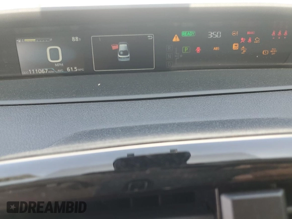 2021 Toyota Prius L Eco with VIN JTDKAMFU1M3151330, listed as a Copart auction lot 58827615 with 111,067 mi miles and Salvage title. Bid and sale history available at DreamBid. Image 3.