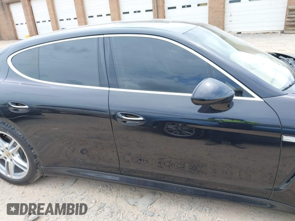 2013 Porsche Panamera 4S z VIN WP0AB2A71DL061108, wystawiony jako IAAI lot #42063281 z przebiegiem 90 100 mil mil oraz . Historia ofert i sprzedaży dostępna na DreamBid. Obrazek 14.