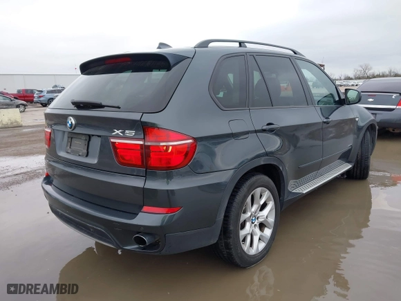 2011 BMW X5 35i with VIN 5UXZV4C51BL414668, listed as a IAAI auction lot 41532939 with 108,552 mi miles. Bid and sale history available at carsss.com. Image 4.