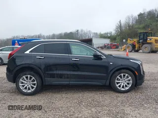 2023 Cadillac XT4 AWD Luxury with VIN 1GYFZBR42PF103973, listed as a IAAI auction lot 41902923 with 70,571 mi miles and . Bid and sale history available at DreamBid. Image 14.