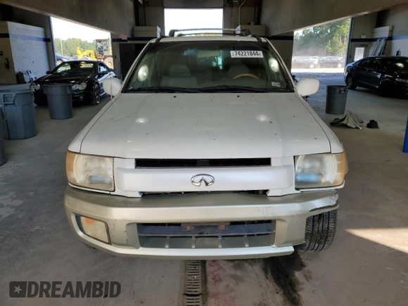 2001 Infiniti QX4 Luxury z VIN JNRDR09Y81W219674, wystawiony jako Copart lot #74221844 z przebiegiem 167 787 mil mil oraz Szkody całkowita. Historia ofert i sprzedaży dostępna na DreamBid. Obrazek 5.