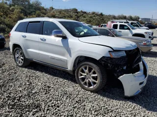 2014 Jeep Grand Cherokee Summit with VIN 1C4RJFJTXEC134150, listed as a Copart auction lot 61859265 with 159,262 mi miles and Salvage title. Bid and sale history available at DreamBid. Image 4.