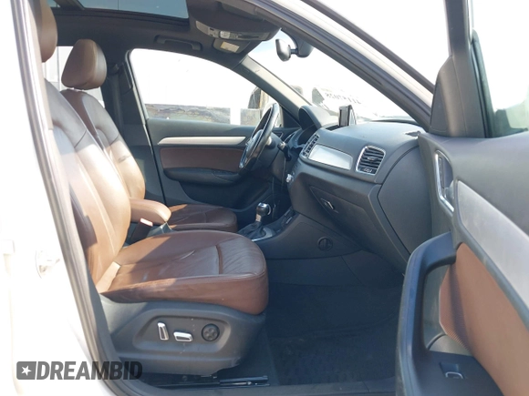 2018 Audi Q3 Premium with VIN WA1BCCFS8JR001155, listed as a IAAI auction lot 41157028 with 83,769 mi miles. Bid and sale history available at carsss.com. Image 5.